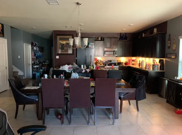 a view of a dining room with furniture
