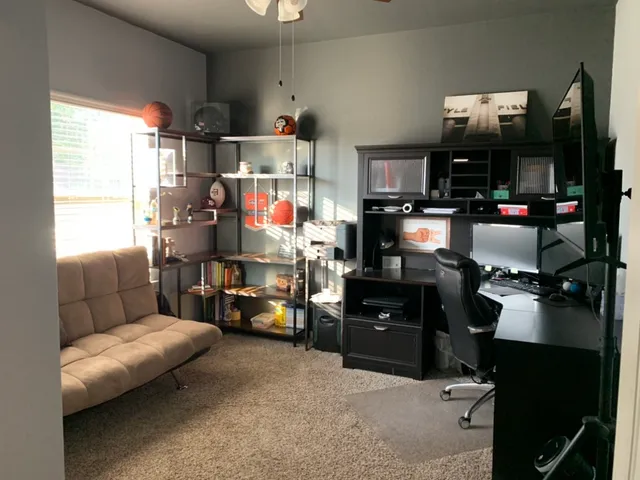 a kitchen with furniture cabinets and a window