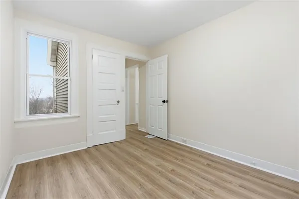 an empty room with windows