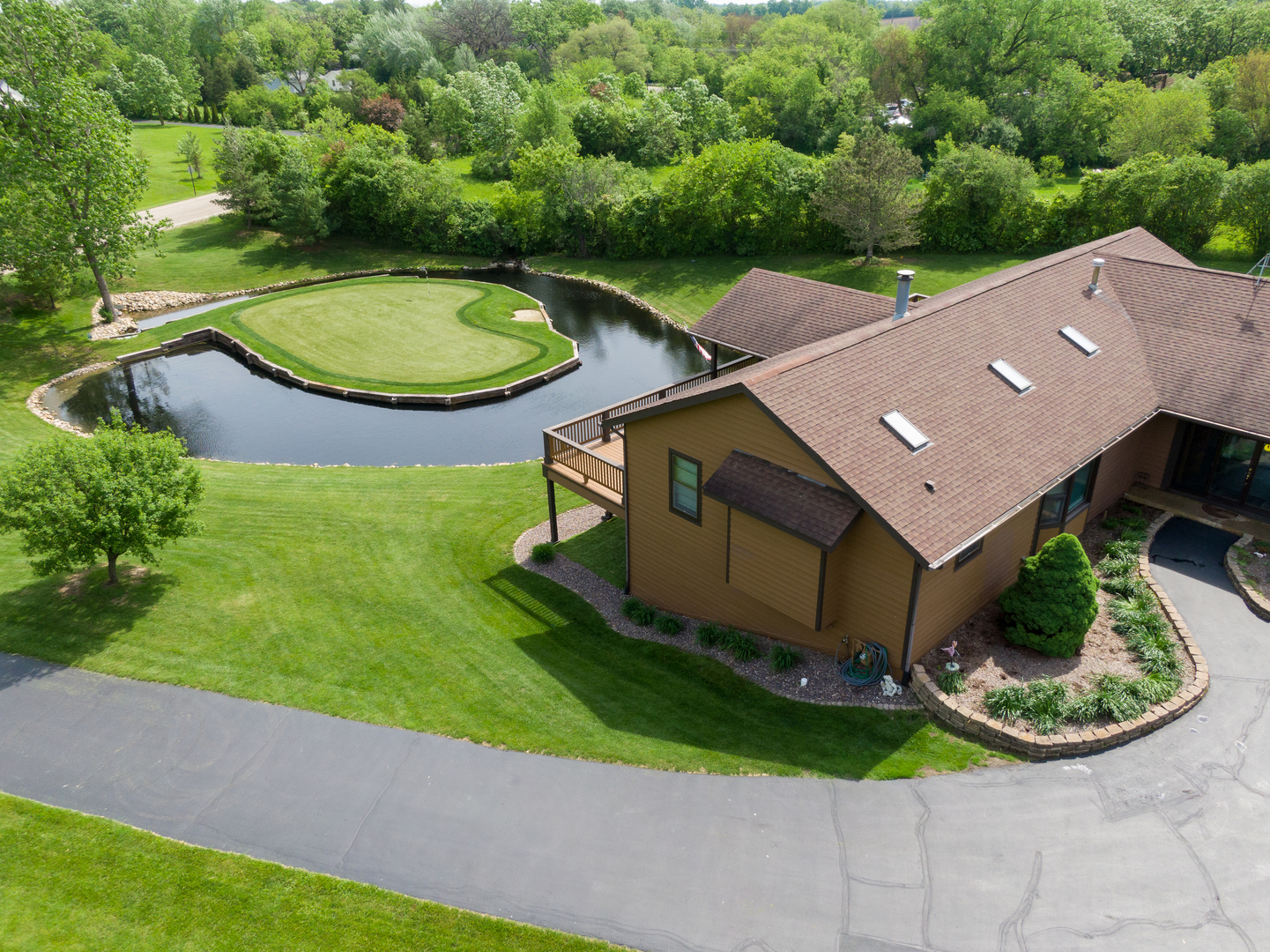 24717 West Caine Road Ingleside, IL 60041 - Photo 1 of 40 an aerial view of a house
