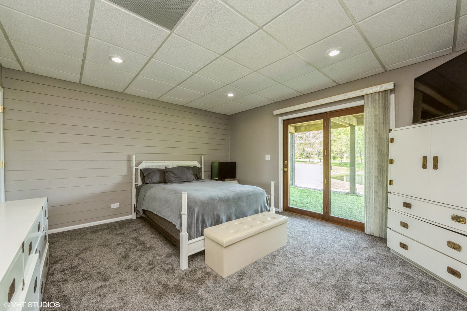 24717 West Caine Road Ingleside, IL 60041 - Photo 11 of 40 a spacious bedroom with a bed and a large window
