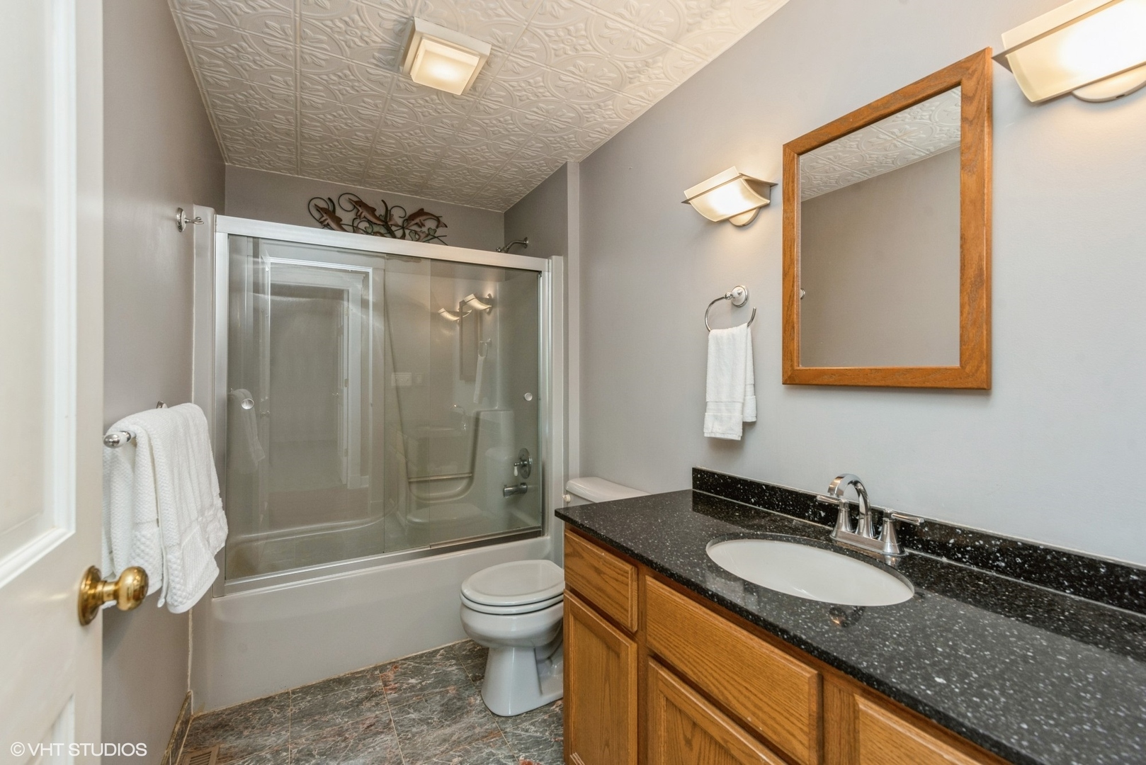 24717 West Caine Road Ingleside, IL 60041 - Photo 13 of 40 a bathroom with a granite countertop sink toilet and shower