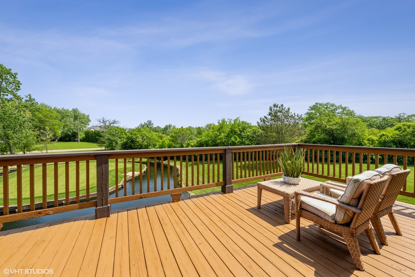 24717 West Caine Road Ingleside, IL 60041 - Photo 16 of 40 a view of balcony with wooden floor and fence