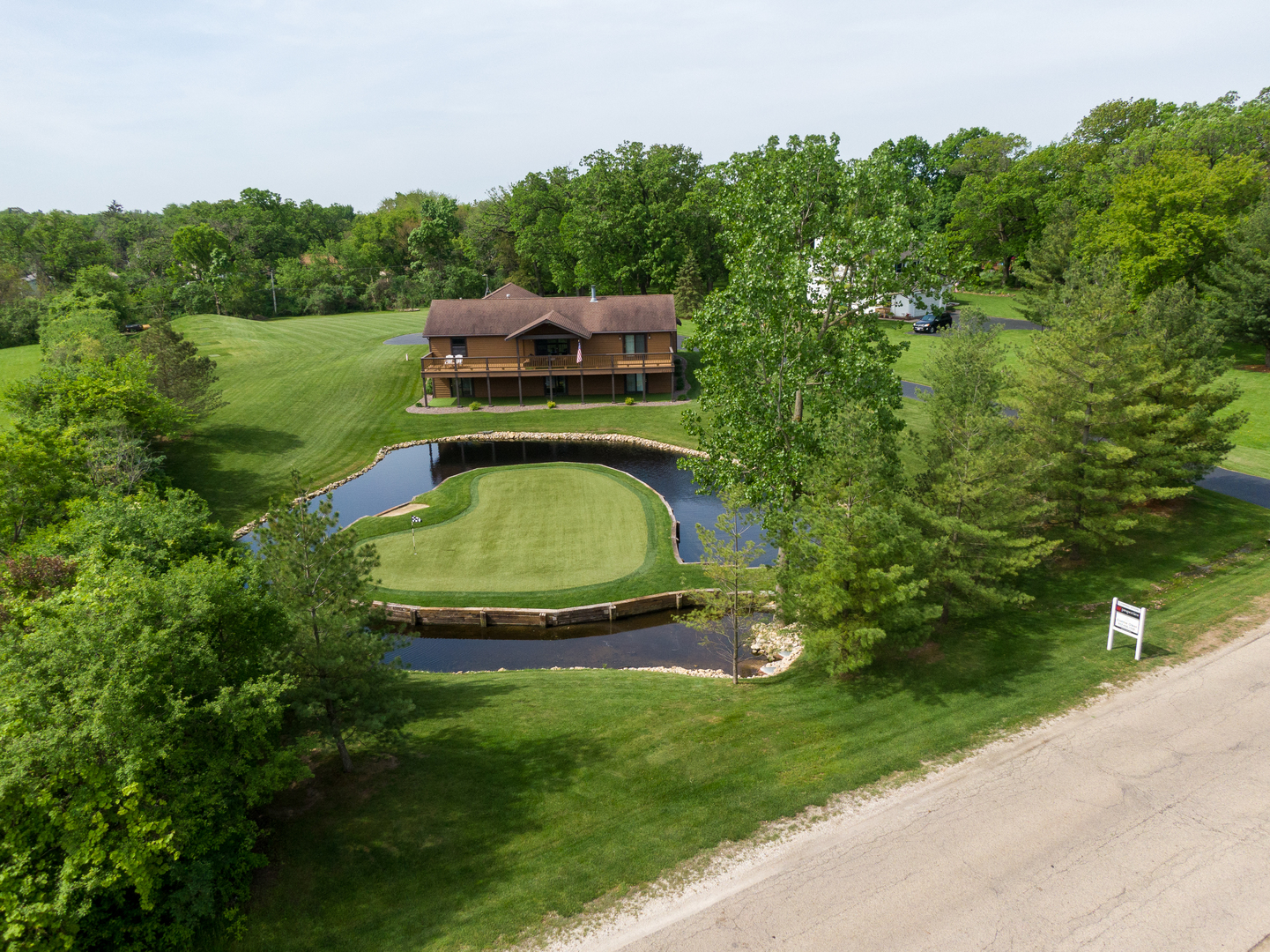 24717 West Caine Road Ingleside, IL 60041 - Photo 24 of 40 a view of a backyard with swimming pool