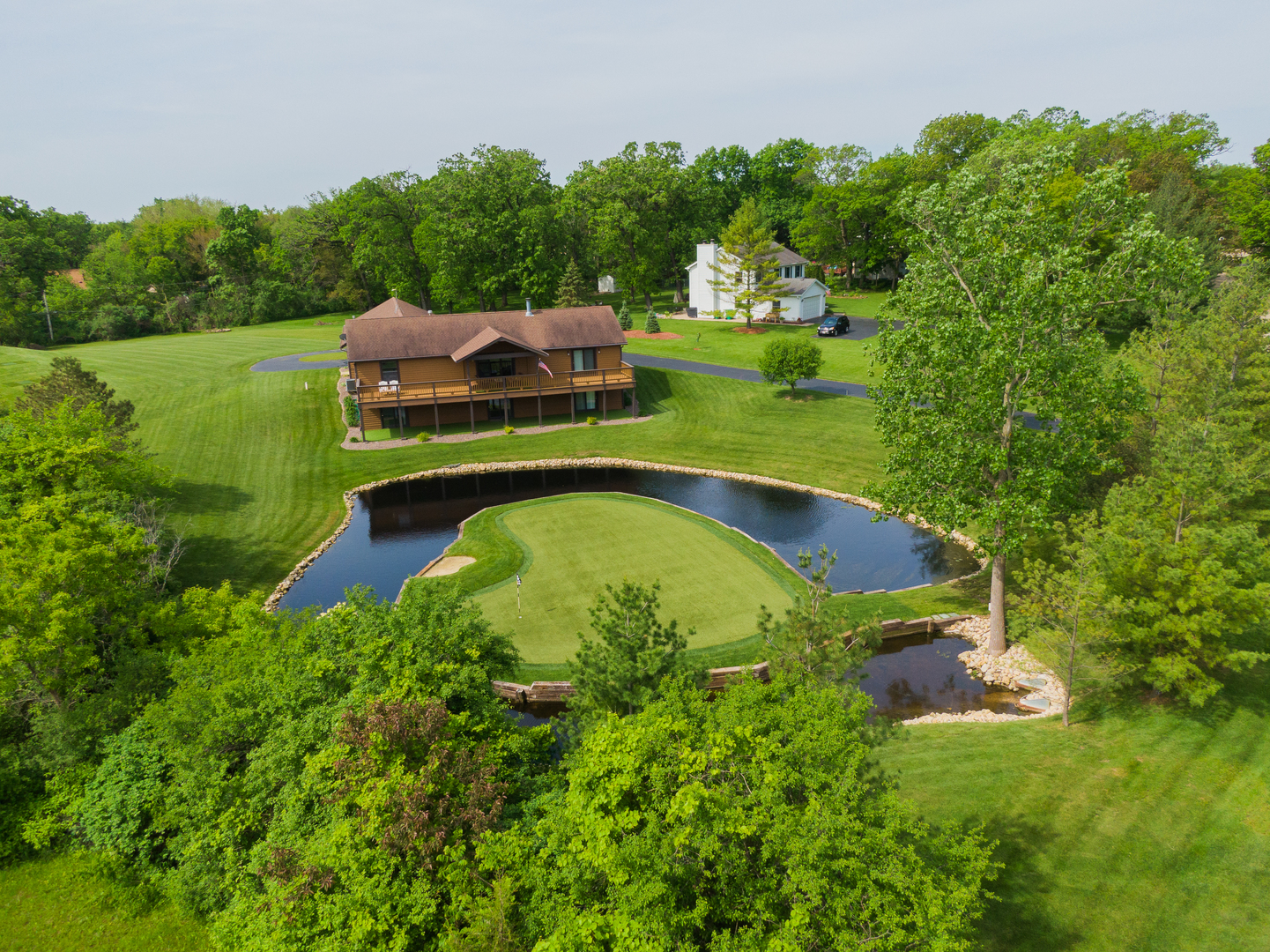 24717 West Caine Road Ingleside, IL 60041 - Photo 25 of 40 a view of a garden with large trees