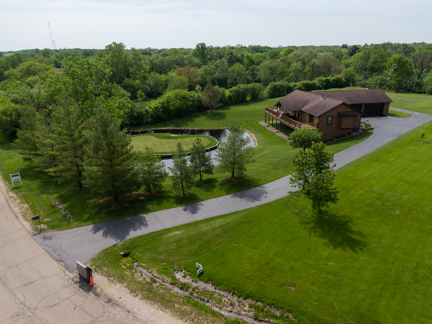 24717 West Caine Road Ingleside, IL 60041 - Photo 32 of 40 an aerial view of a house with yard swimming pool and outdoor seating