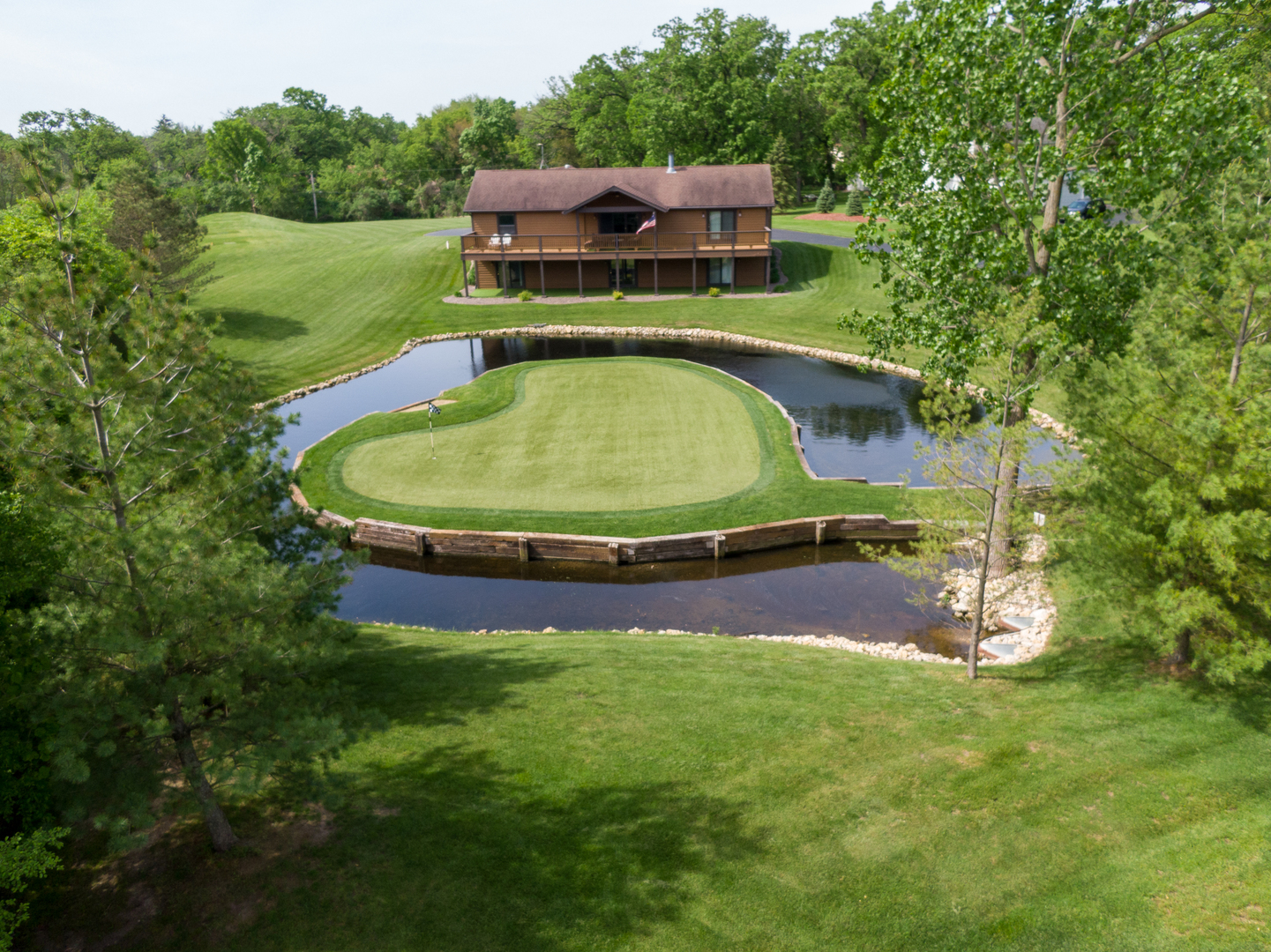 24717 West Caine Road Ingleside, IL 60041 - Photo 35 of 40 a view of a swimming pool with a yard