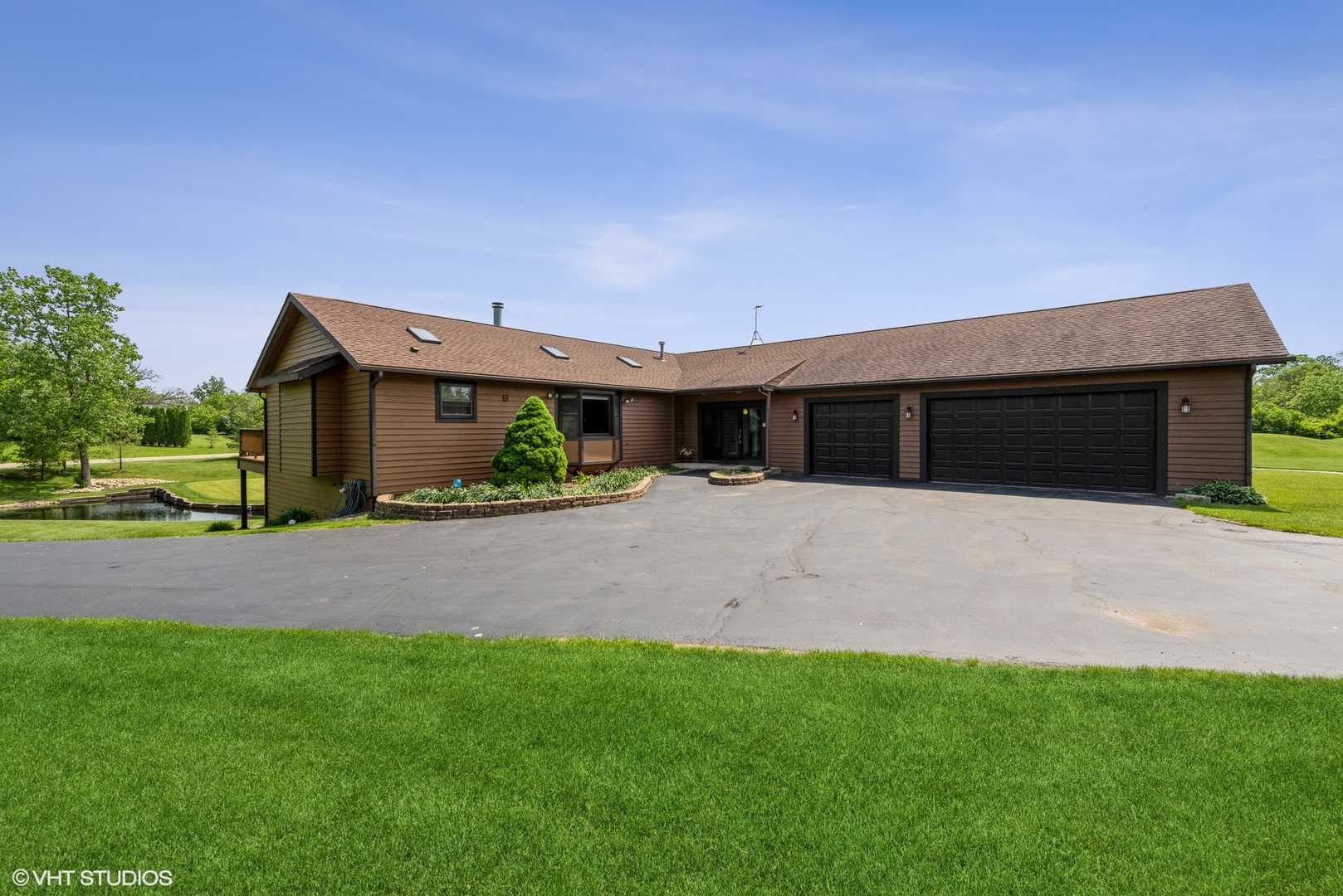 24717 West Caine Road Ingleside, IL 60041 - Photo 39 of 40 a front view of house with yard and green space