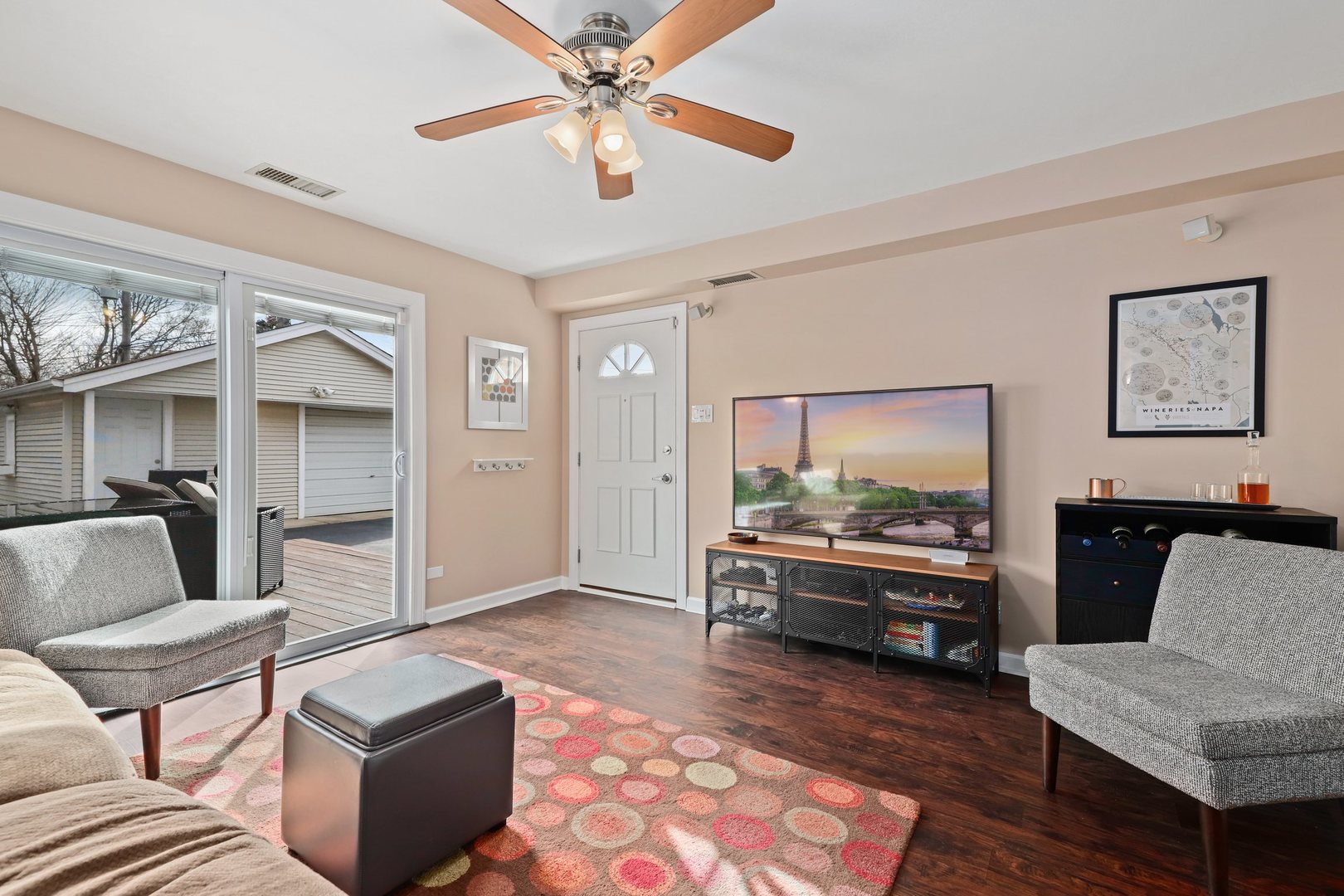 5815 North Canfield Avenue Chicago, IL 60631 - Photo 2 of 31 a living room with furniture and a flat screen tv