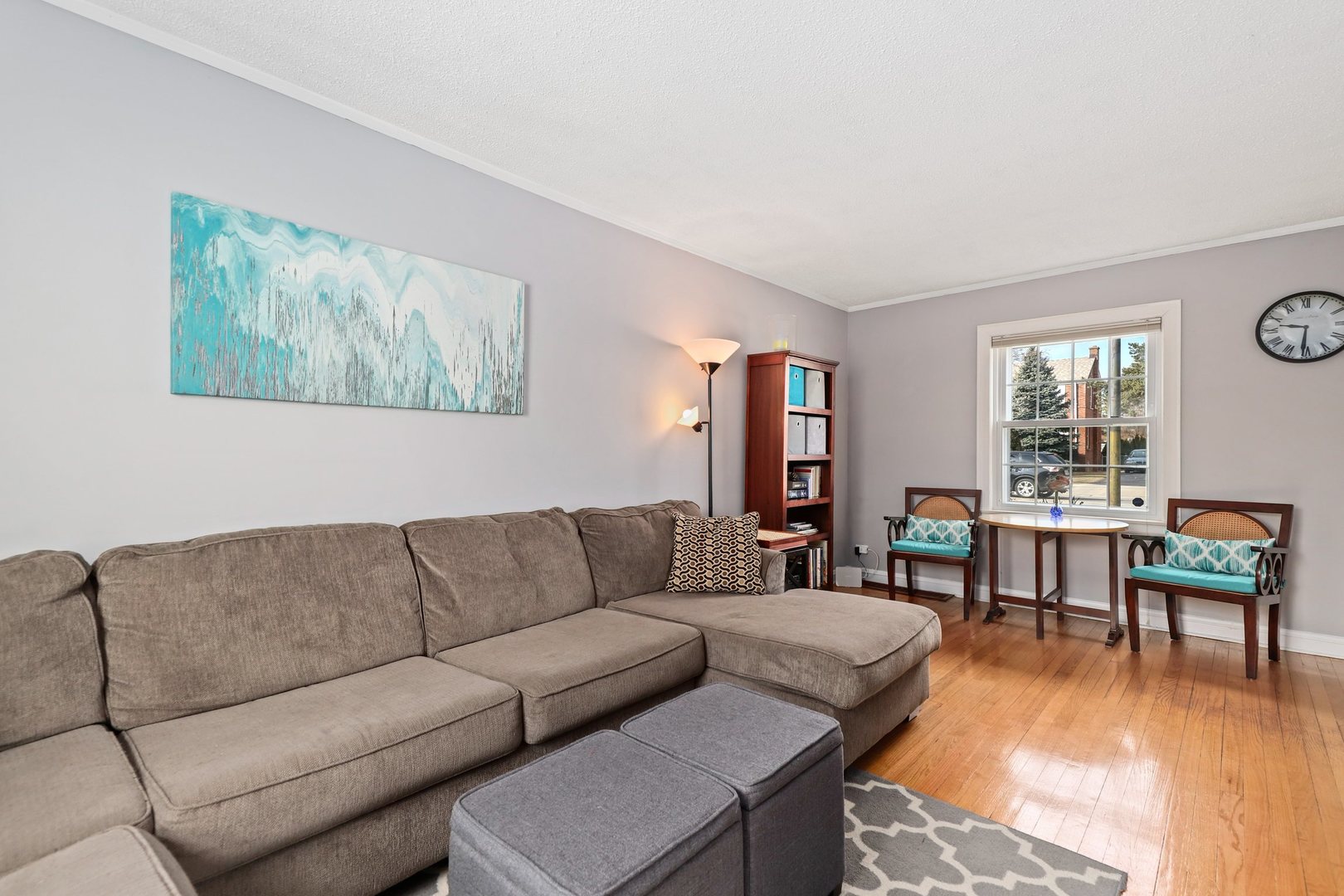 5815 North Canfield Avenue Chicago, IL 60631 - Photo 12 of 31 a living room with furniture and a large window