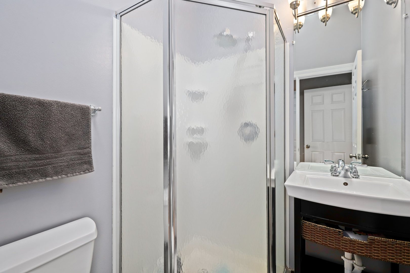 5815 North Canfield Avenue Chicago, IL 60631 - Photo 16 of 31 a bathroom with a sink and a mirror