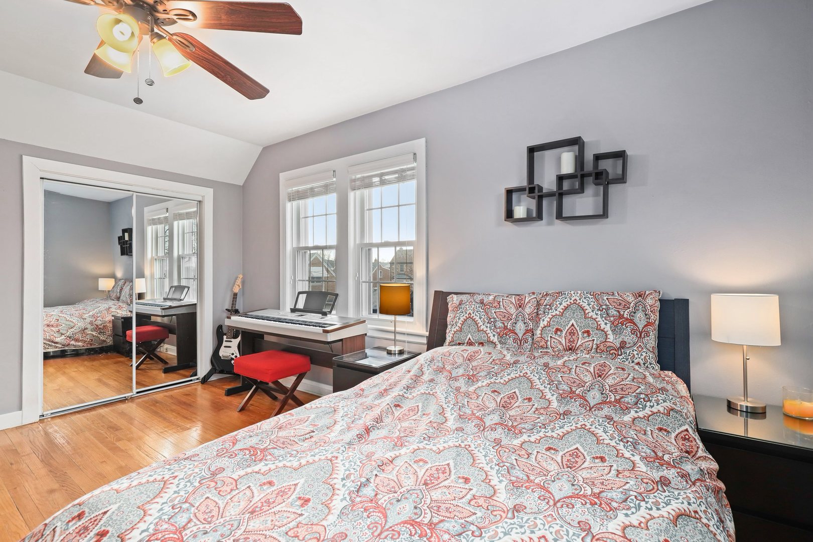 5815 North Canfield Avenue Chicago, IL 60631 - Photo 20 of 31 a bedroom with a bed and wooden floor