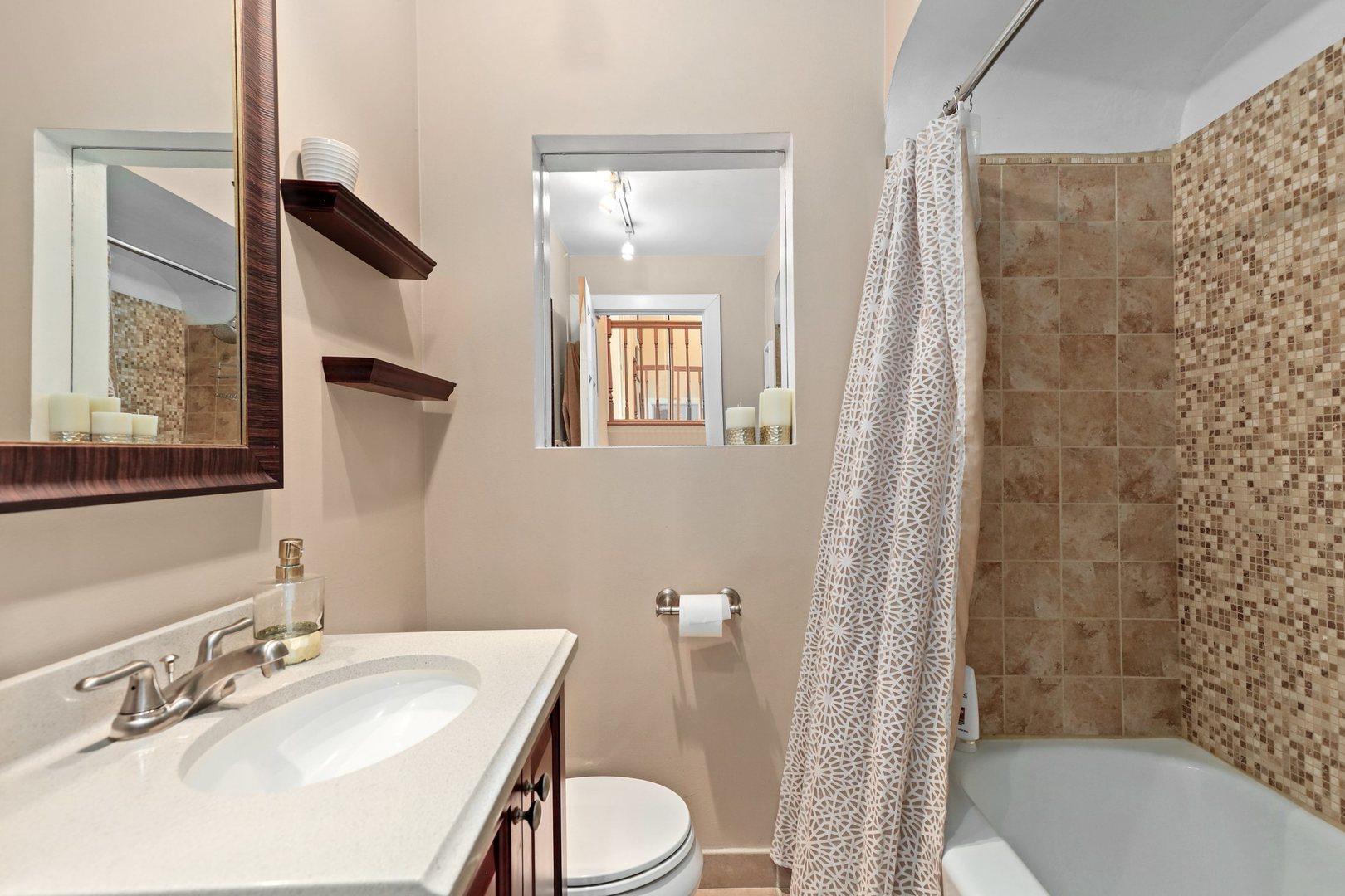 5815 North Canfield Avenue Chicago, IL 60631 - Photo 21 of 31 a bathroom with a sink toilet and shower