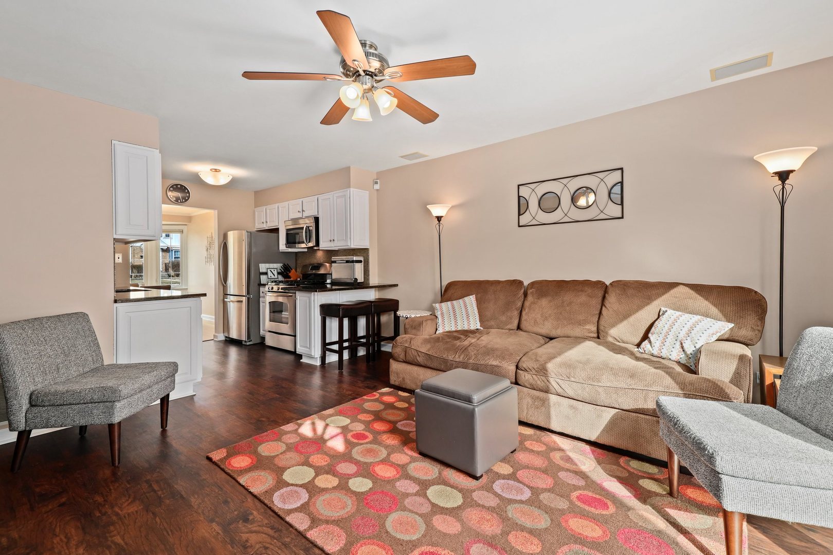 5815 North Canfield Avenue Chicago, IL 60631 - Photo 4 of 31 a living room with furniture and kitchen view