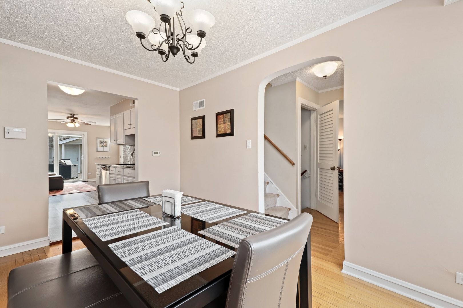 5815 North Canfield Avenue Chicago, IL 60631 - Photo 10 of 31 a view of a workspace with furniture and wooden floor