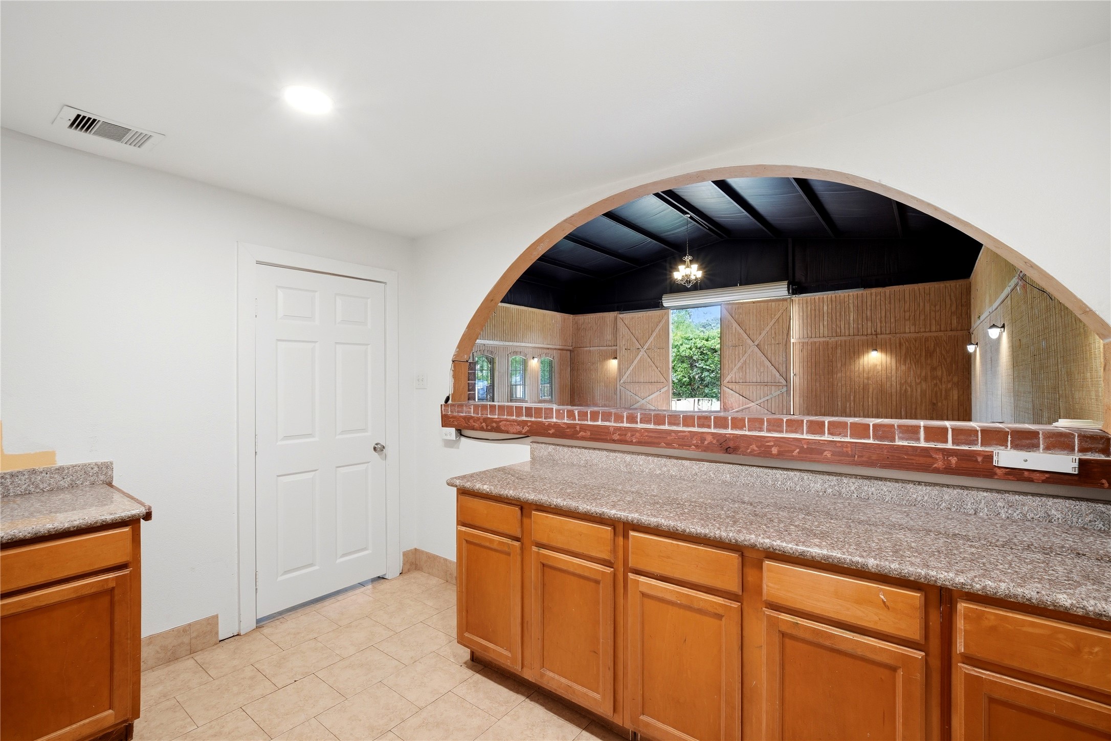 11741 Ezekiel Road Tomball, TX 77375 - Photo 19 of 30 a kitchen with a sink and cabinets