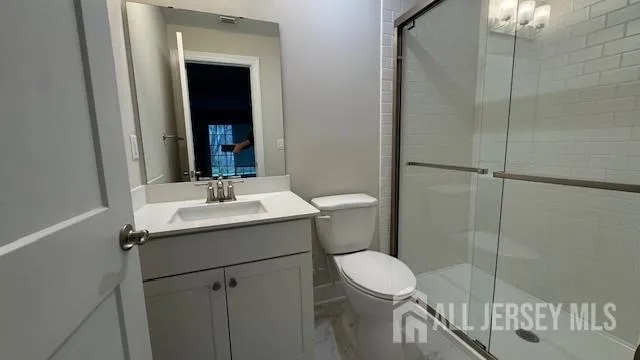 a view of an empty room and stairs