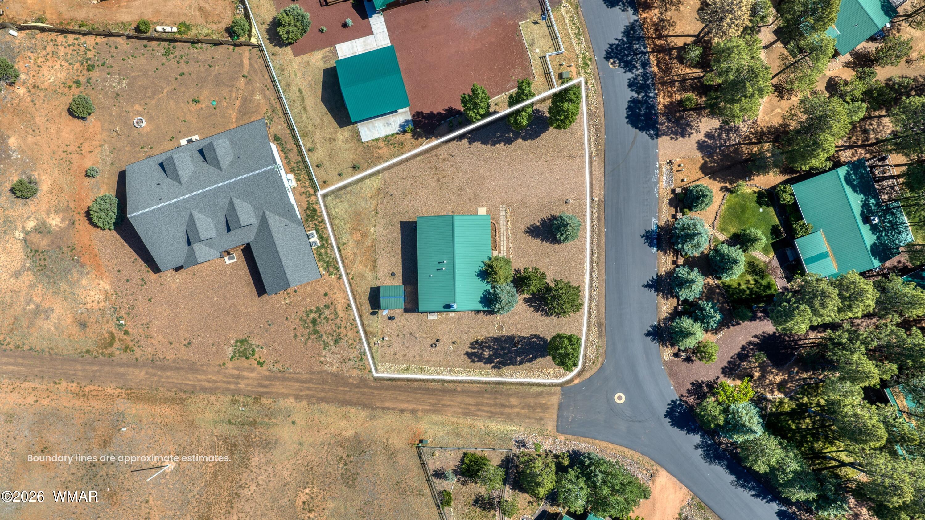 2722 Bain Trail Overgaard, AZ 85933 - Photo 19 of 28 an aerial view of a house with a yard