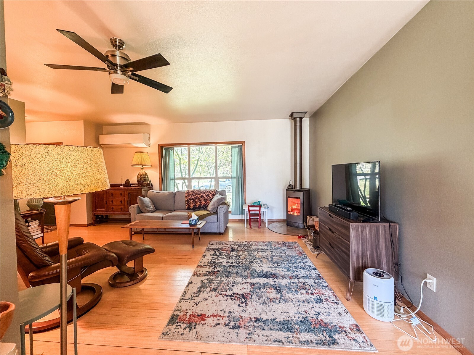 5178 Orcas Road Orcas Island, WA 98245 - Photo 12 of 28 a living room with furniture and a flat screen tv