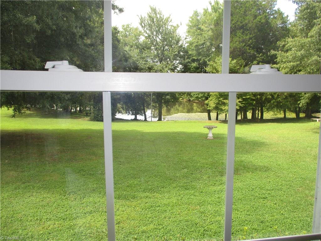 3242 Wayne White Road Climax, NC 27233 - Photo 4 of 11 Beautiful home with circle driveway