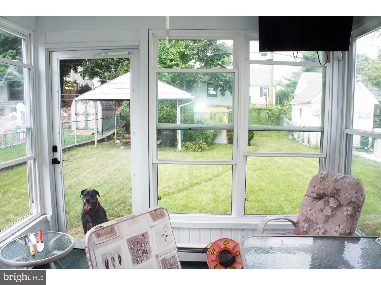 916 Kingsman Road Boothwyn, PA 19061 - Photo 14 of 17 Enclosed Porch