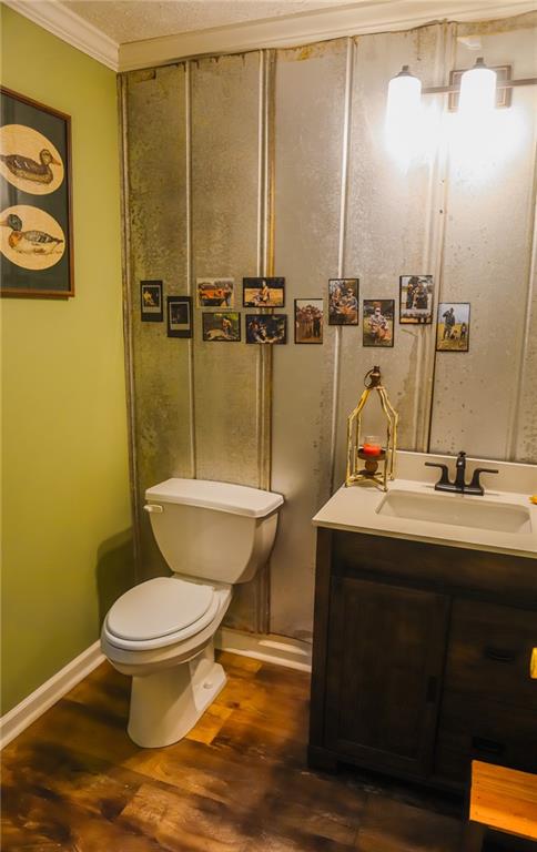 1665 Jackson Lake Road Mansfield, GA 30055 - Photo 16 of 16 a bathroom with a sink toilet and shower