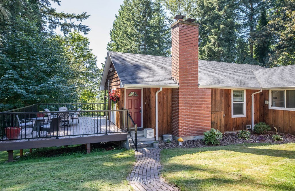 10627 Cherry Road Lake Stevens, WA 98258 - Photo 3 of 38 a view of a house with a yard and sitting area