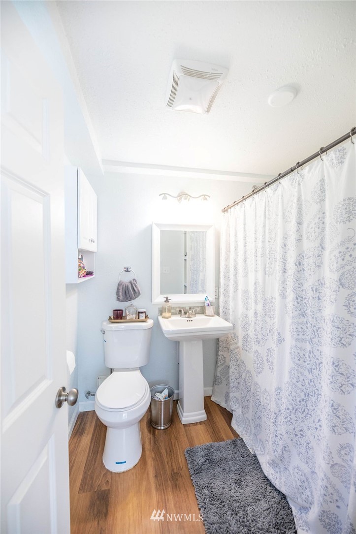10627 Cherry Road Lake Stevens, WA 98258 - Photo 22 of 38 a bathroom with a sink toilet and shower