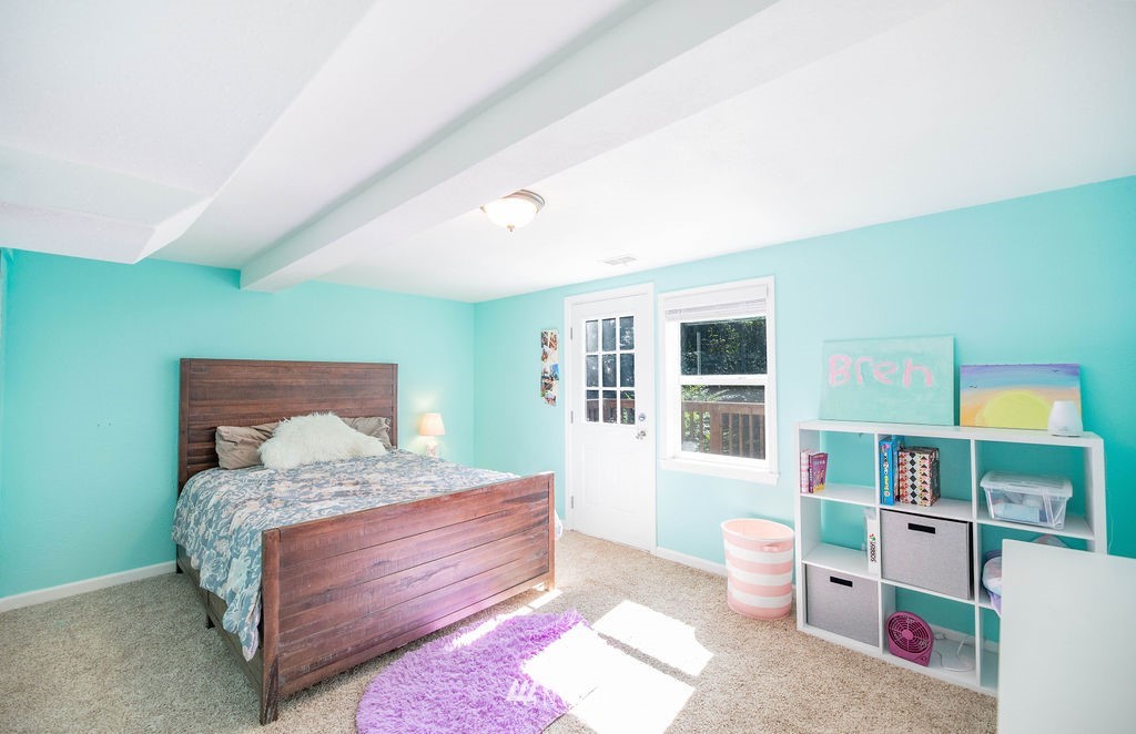 10627 Cherry Road Lake Stevens, WA 98258 - Photo 25 of 38 a bed room with a bed and a closet