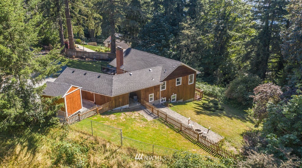 10627 Cherry Road Lake Stevens, WA 98258 - Photo 30 of 38 a aerial view of a house with swimming pool and trees