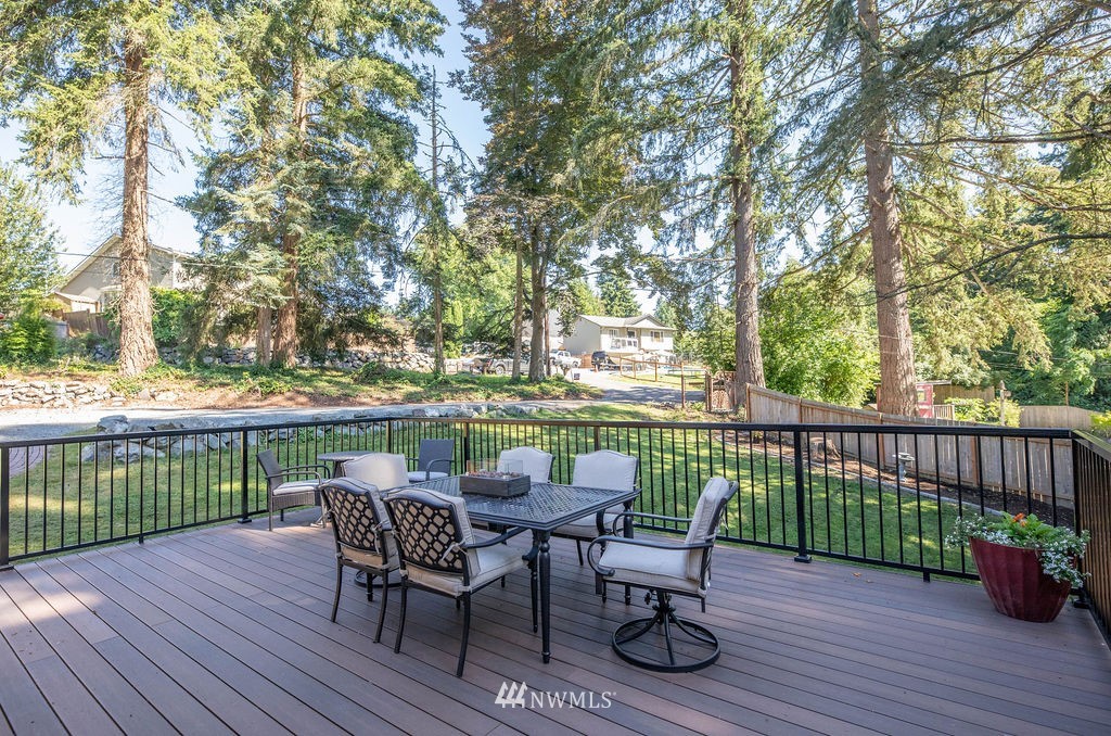 10627 Cherry Road Lake Stevens, WA 98258 - Photo 35 of 38 a view of a chair and table on the wooden floor