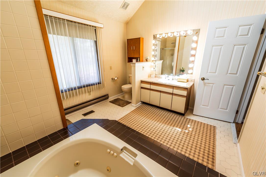 1201 Butztown Road, Unit 24 Bethlehem, PA 18017 - Photo 18 of 30 a bathroom with a sink and a bathtub