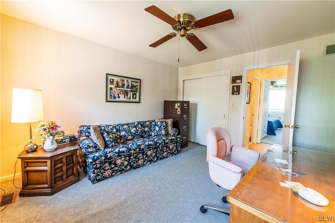 1201 Butztown Road, Unit 24 Bethlehem, PA 18017 - Photo 21 of 30 a bed room with a bed window and a couch