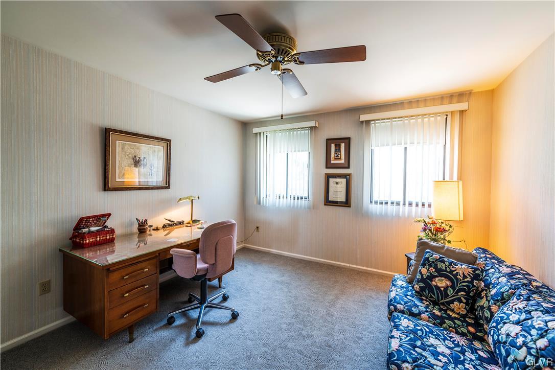 1201 Butztown Road, Unit 24 Bethlehem, PA 18017 - Photo 22 of 30 a living room with furniture and a chandelier
