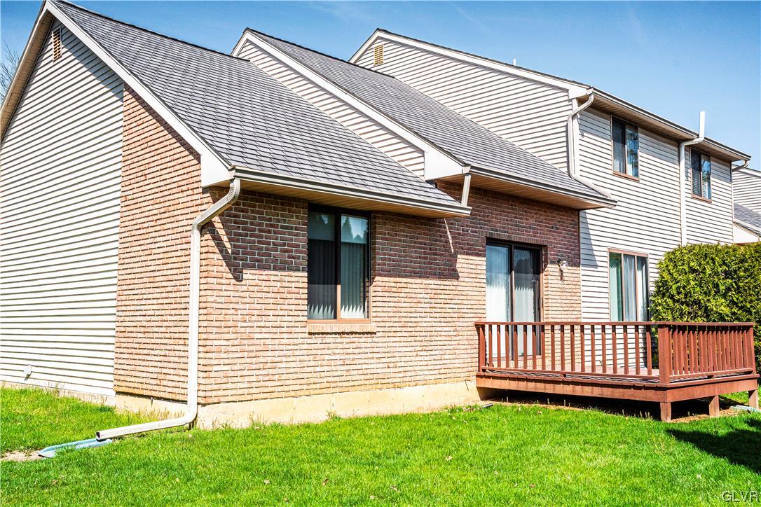 1201 Butztown Road, Unit 24 Bethlehem, PA 18017 - Photo 30 of 30 a view of a house with a backyard