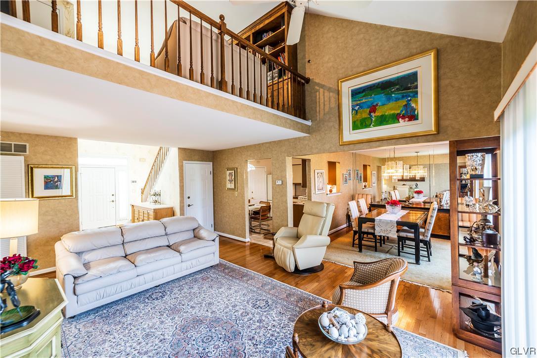 1201 Butztown Road, Unit 24 Bethlehem, PA 18017 - Photo 7 of 30 a living room with fireplace furniture and a rug