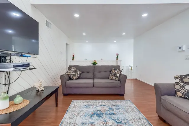 a living room with furniture and a couch