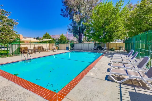 a view of a backyard with a patio