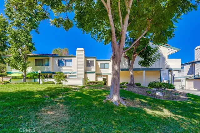 a view of house with outdoor space