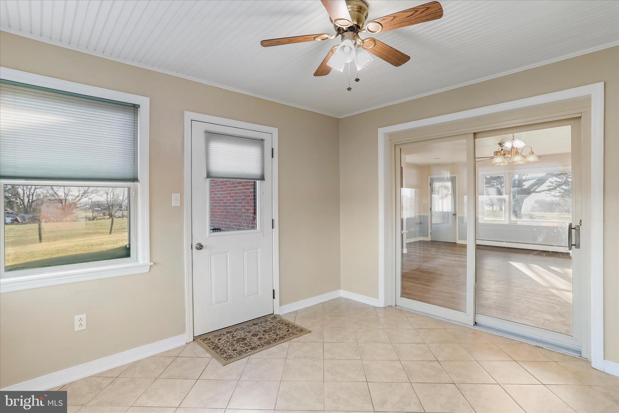 13728 Broadfording Church Road Hagerstown, MD 21740 - Photo 12 of 44 a view of an entryway with a chandelier fan