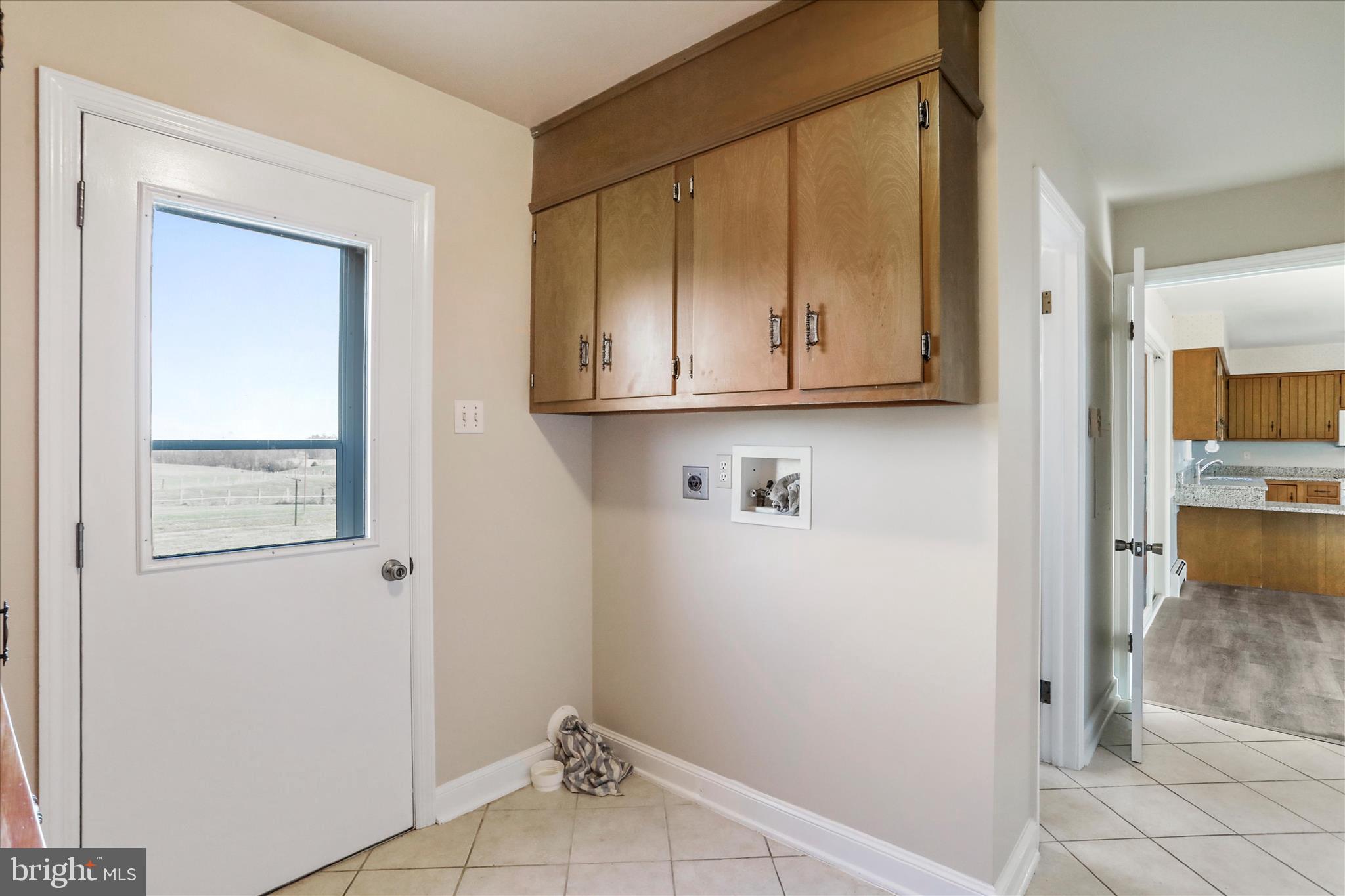 13728 Broadfording Church Road Hagerstown, MD 21740 - Photo 16 of 44 a view of kitchen with wooden floor and cabinets