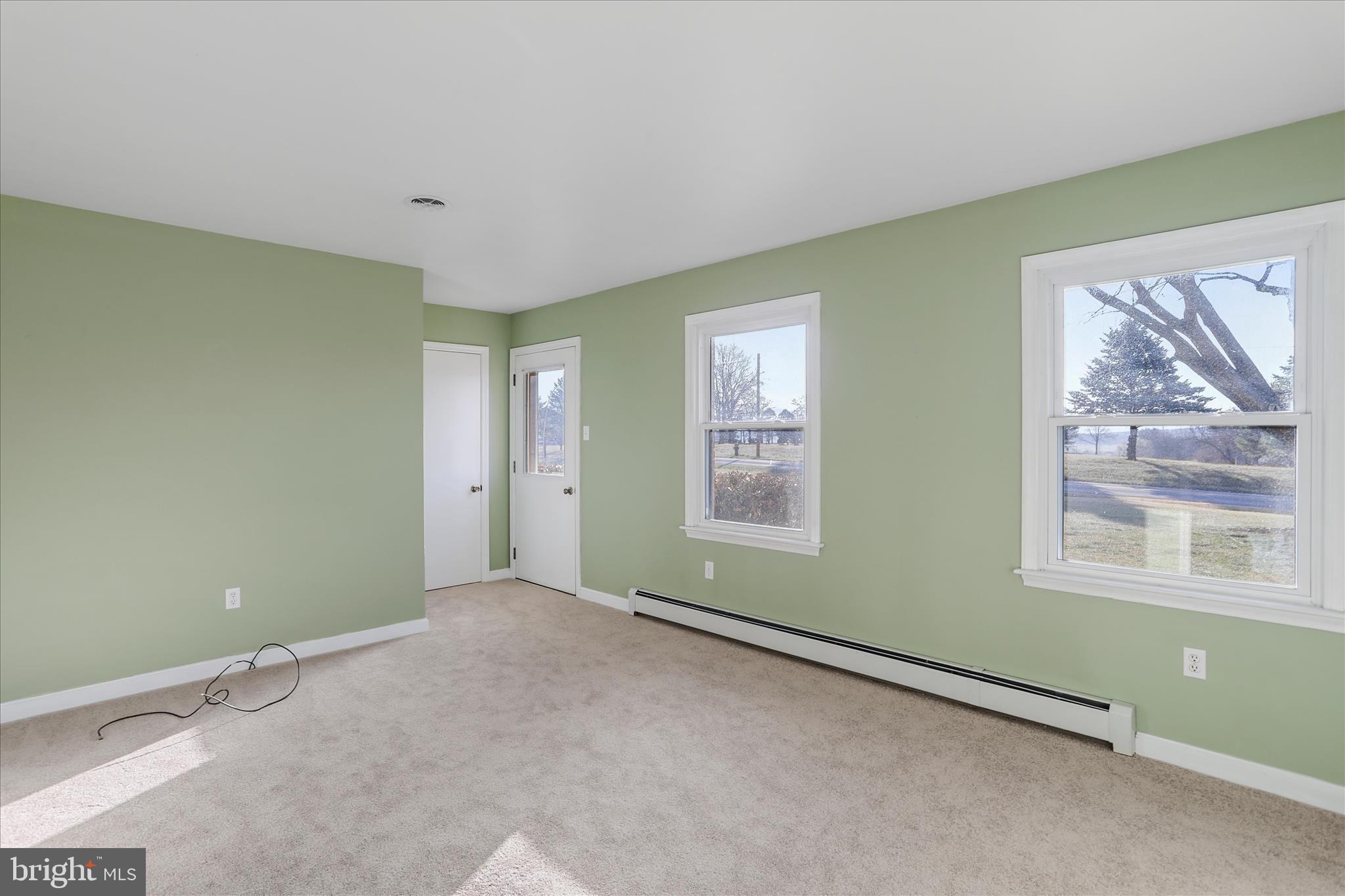 13728 Broadfording Church Road Hagerstown, MD 21740 - Photo 17 of 44 a view of an empty room with a window