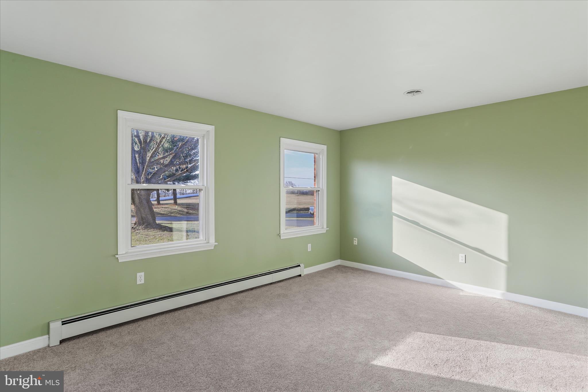 13728 Broadfording Church Road Hagerstown, MD 21740 - Photo 18 of 44 a view of an empty room with a window