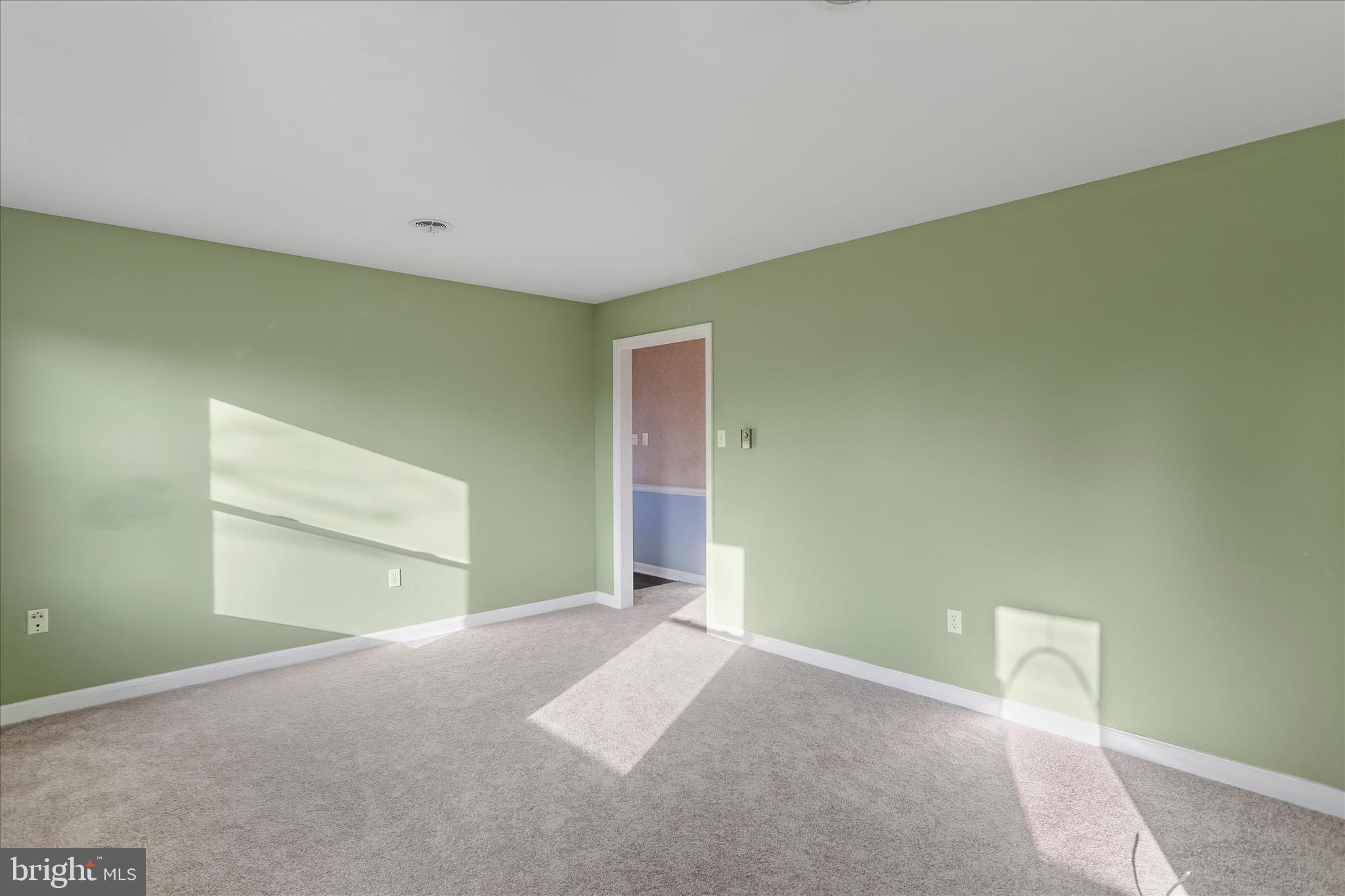 13728 Broadfording Church Road Hagerstown, MD 21740 - Photo 19 of 44 a view of an empty room with a window