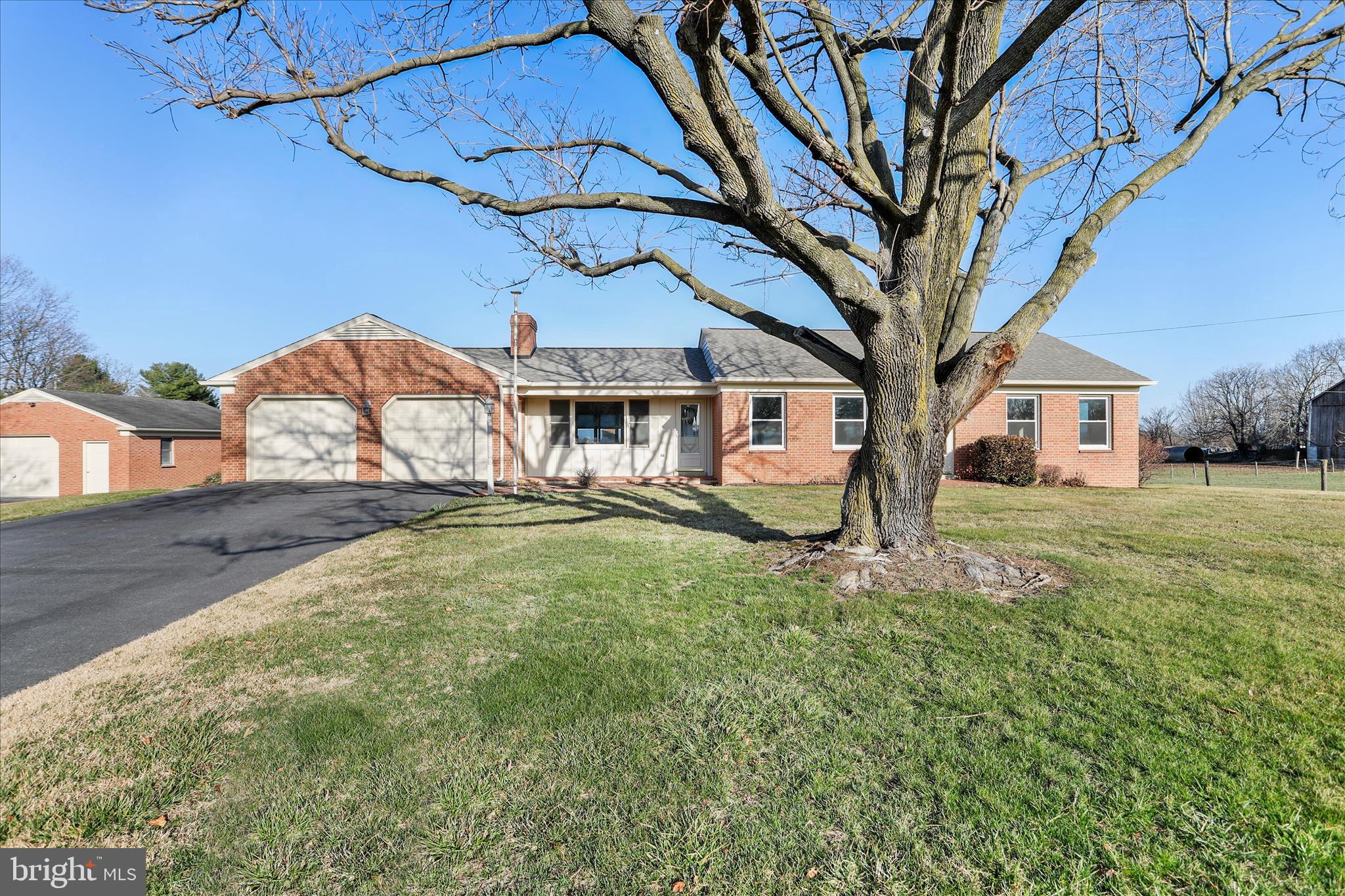 13728 Broadfording Church Road Hagerstown, MD 21740 - Photo 3 of 44 a view of a house with a yard