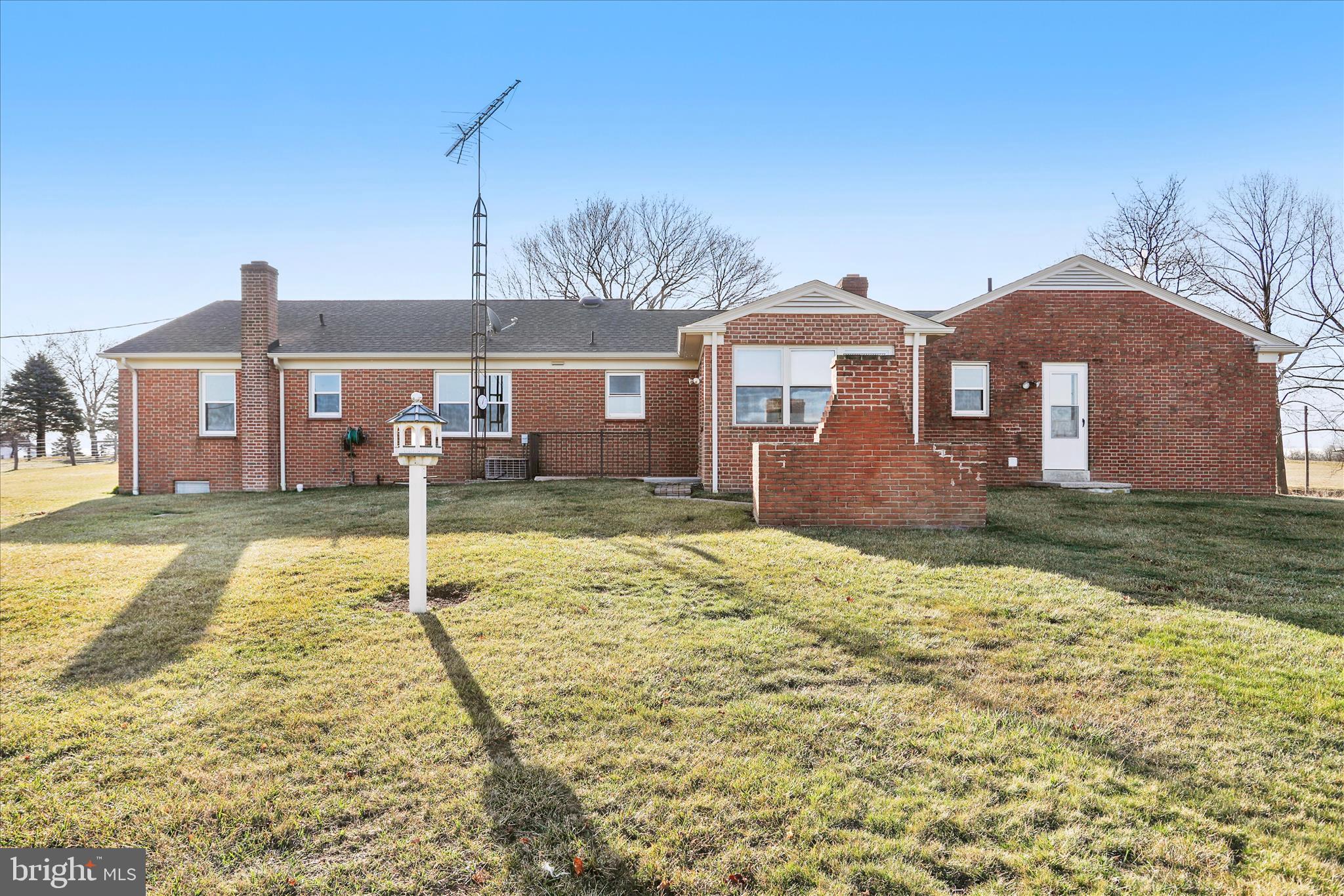 13728 Broadfording Church Road Hagerstown, MD 21740 - Photo 38 of 44 a front view of a house with a yard