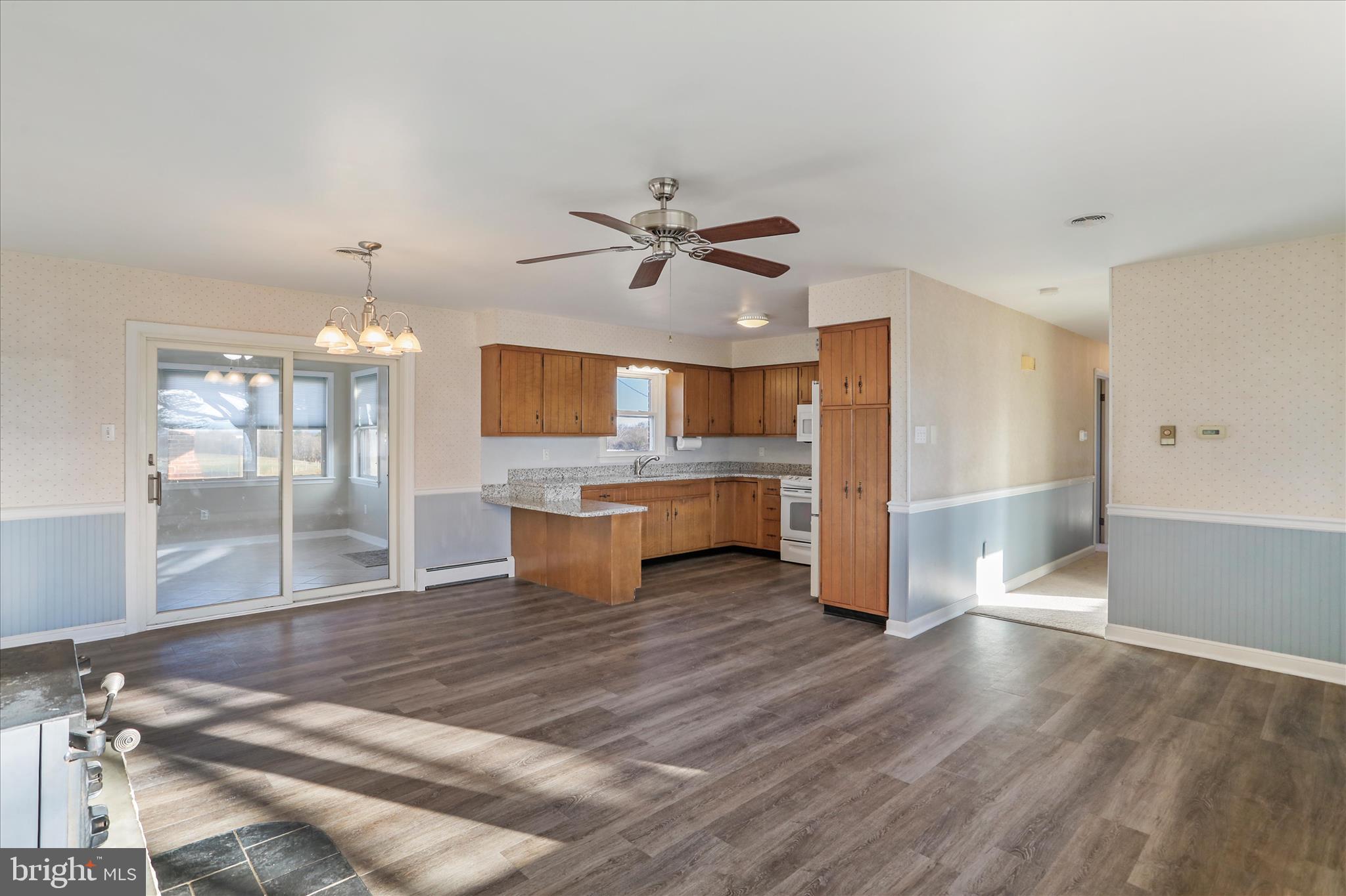 13728 Broadfording Church Road Hagerstown, MD 21740 - Photo 5 of 44 a view of a kitchen with a sink and a window