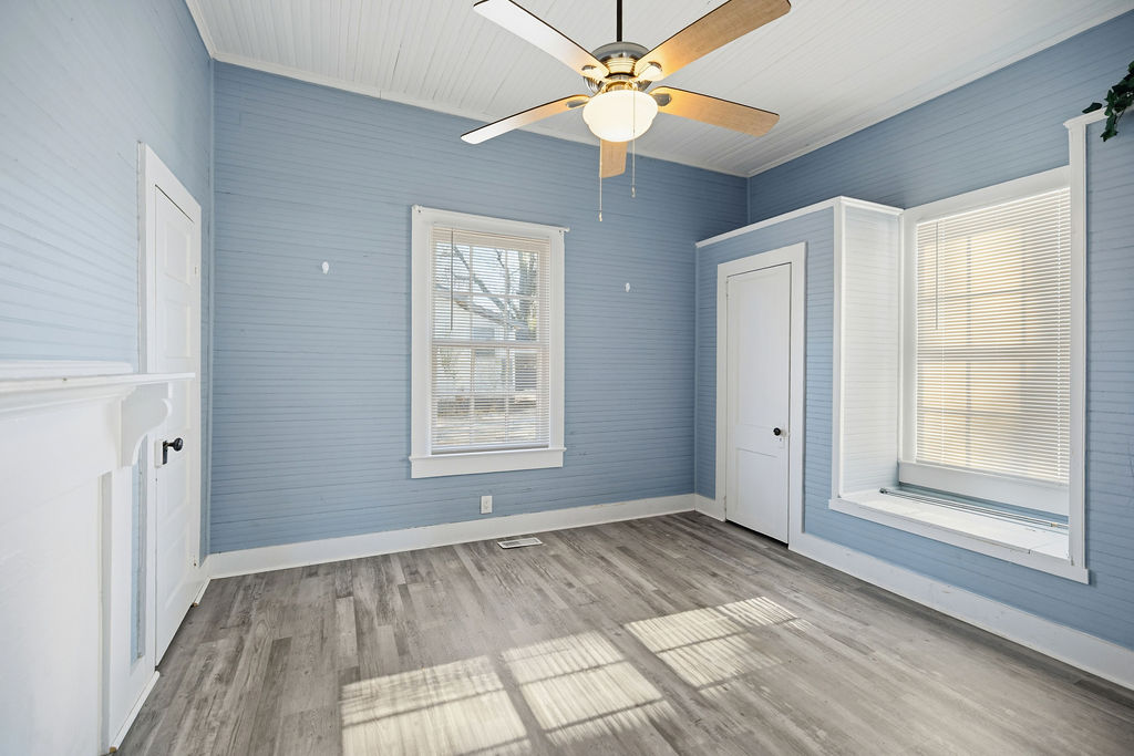 215 Louisiana Street Honea Path, SC 29654 - Photo 17 of 26 This airy room features durable flooring and abundant natural light.