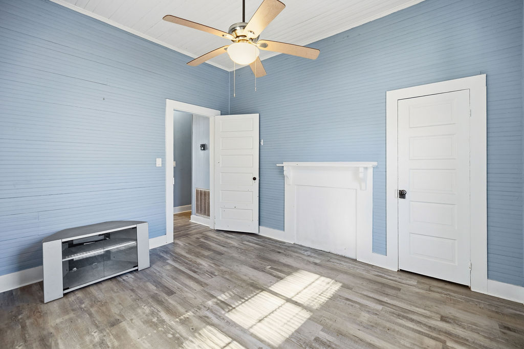 215 Louisiana Street Honea Path, SC 29654 - Photo 19 of 26 This airy room features durable flooring and a bright, inviting atmosphere.