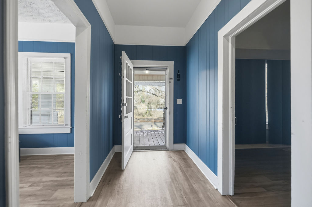 215 Louisiana Street Honea Path, SC 29654 - Photo 5 of 26 This inviting entrance offers warm flooring and views of the surrounding natural landscape.